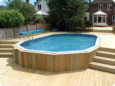 30ft x 15ft  'Classic' Oval with split level decking and timber cladding